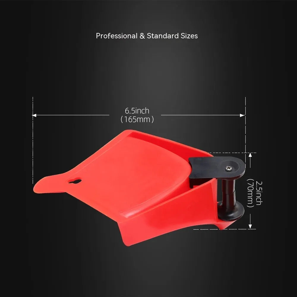 Set of four bright red triangular plastic car parking blocks on a surface.