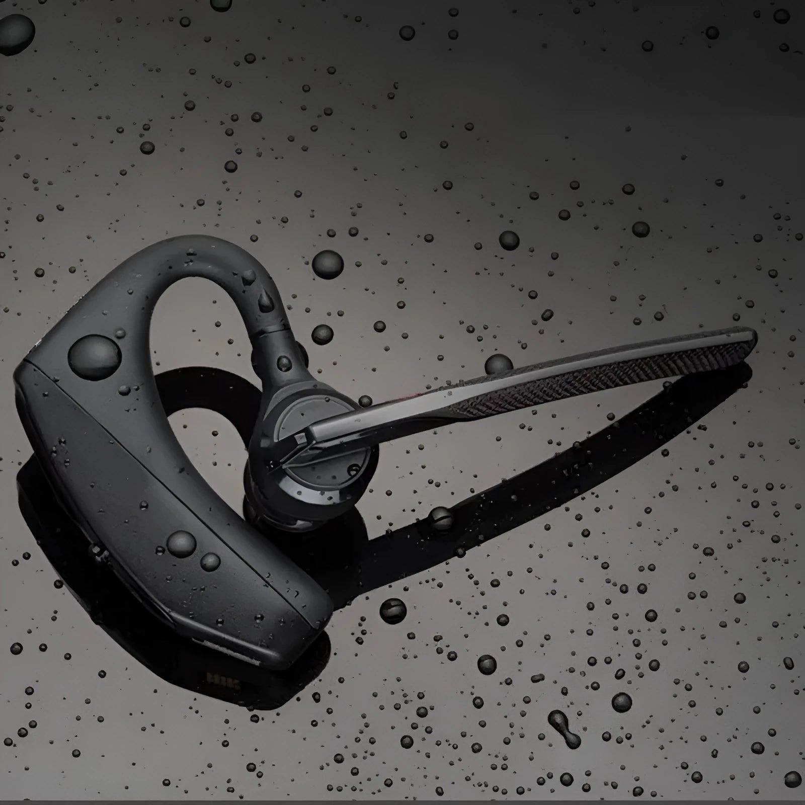 Black plastic Bluetooth sports headphones with a large battery and call function.