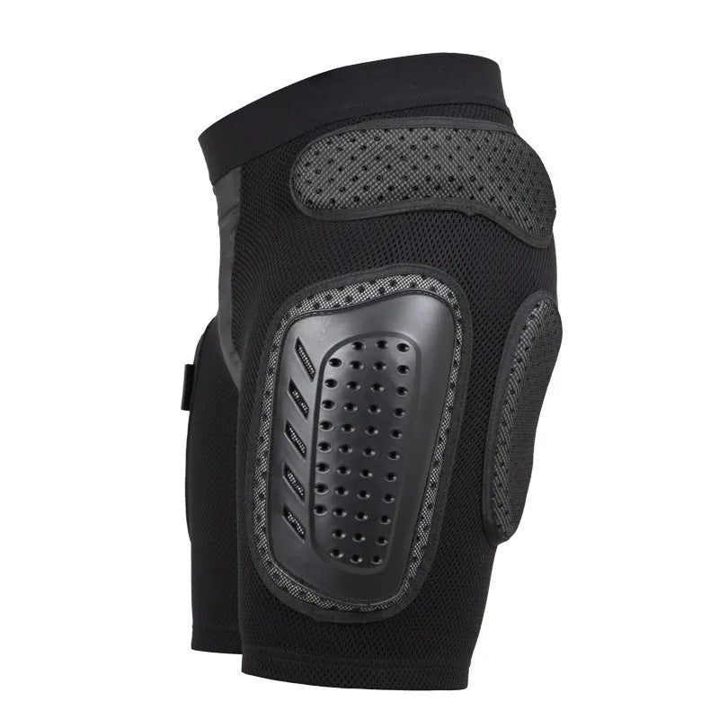 Black cycling protective pants with integrated hip pads, shown in size L for adult mountain bike or BMX use.