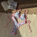 Women's split leopard print polyester bikini set with brief bottom and sleeveless top