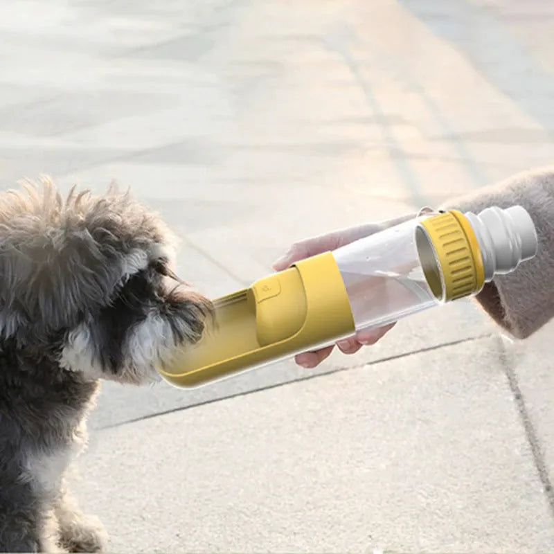 Dark blue portable dog water bottle with integrated bowl, shown with leak-proof cap.