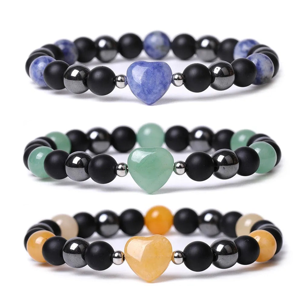 Hand-cut peach heart stone bracelet with geometric moon planet design in Tigereye colour