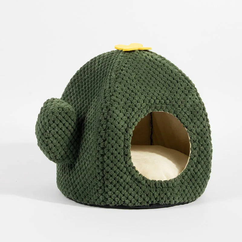 Dark green cactus-shaped enclosed cat bed with a soft interior, shown with a green accent.
