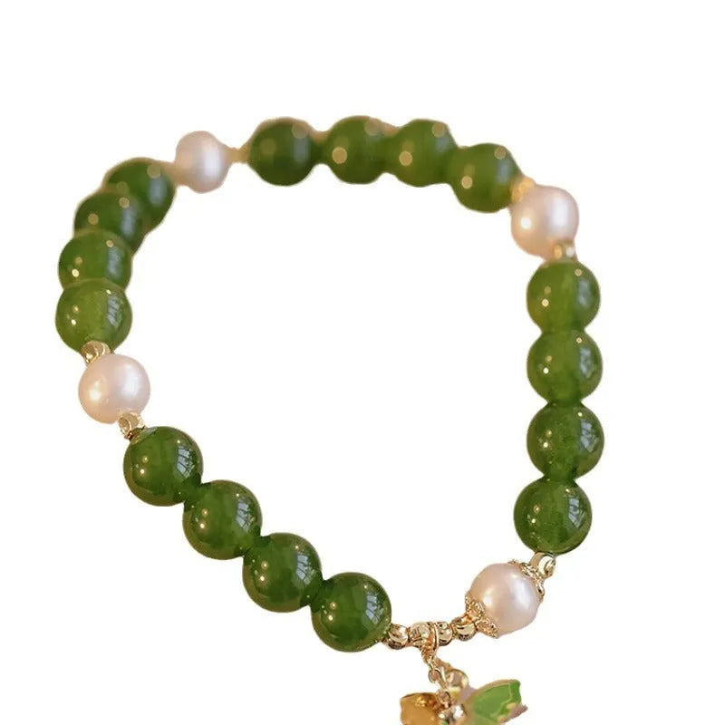 Green chalcedony bracelet with geometric design and round beads for women