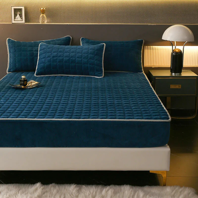 Fleece-lined milk fiber quilted fitted sheet in blue for single bed winter warmth