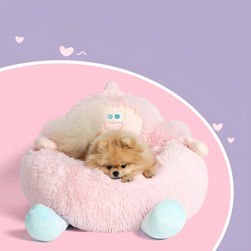 Grey plush pet nest bed with 40cm high sides shown with small dog curled inside