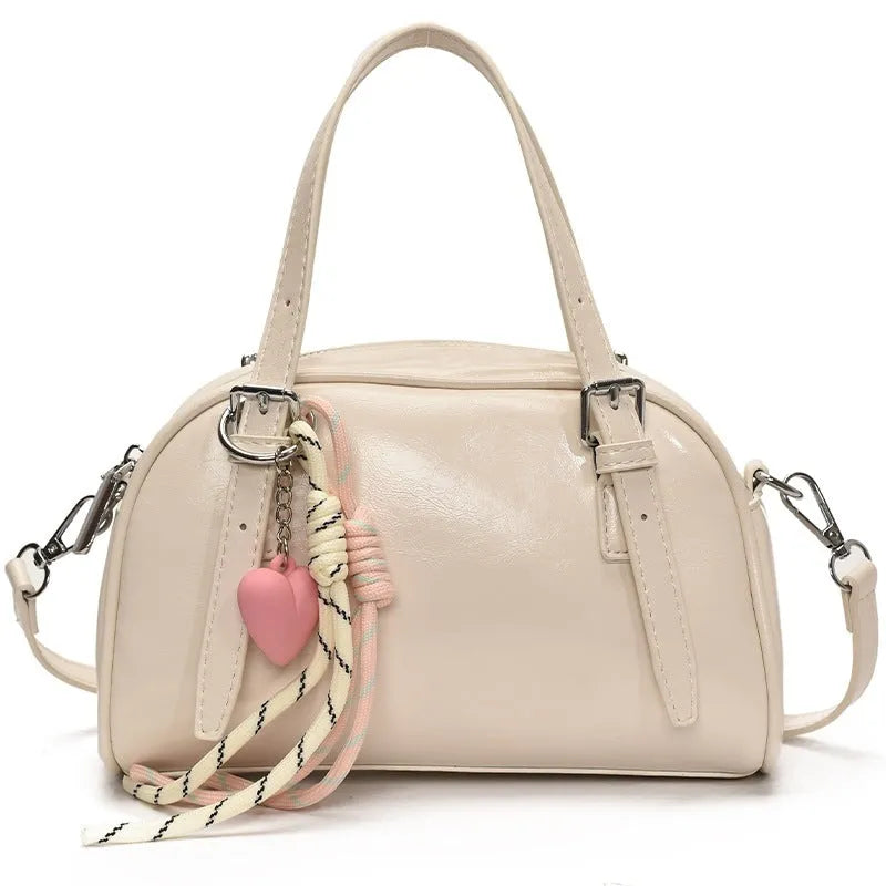 Korean style women's soft PU shoulder bag in shell shape with pendant options