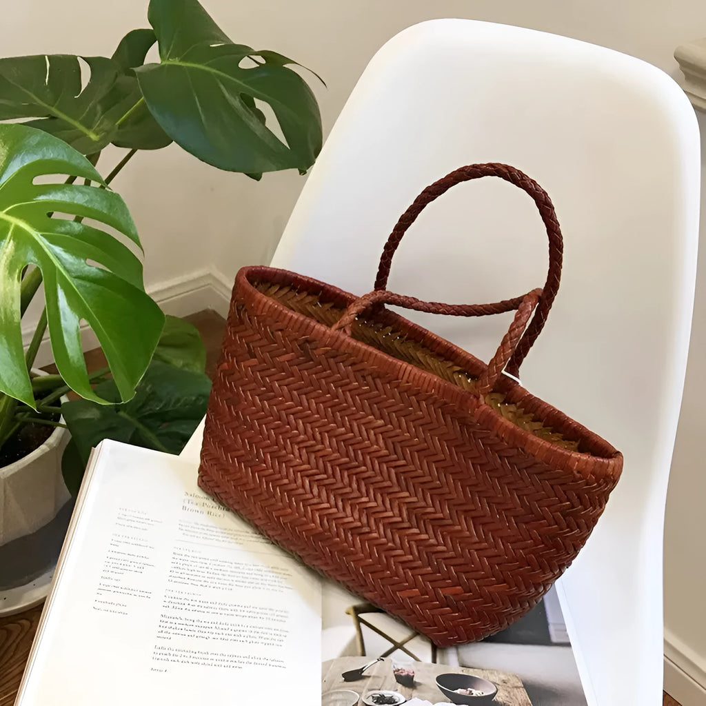 Genuine leather bucket handbag in black, brown, coffee, or white, available in 40x22x15cm and 35x19x14cm sizes