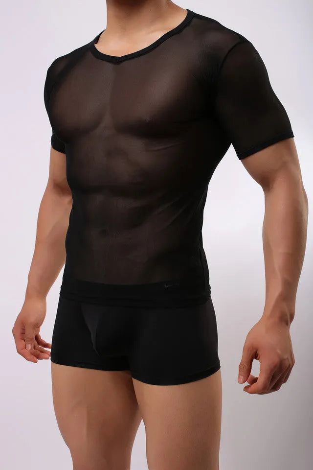 Man wearing a slim fit, translucent mesh t-shirt in a solid colour.