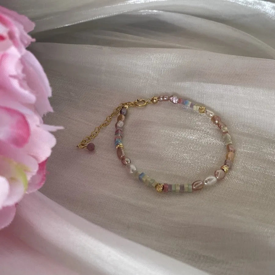 Natural silver pearl bracelet with 14K gilded purple finish and matching necklace on a U-shaped chain.