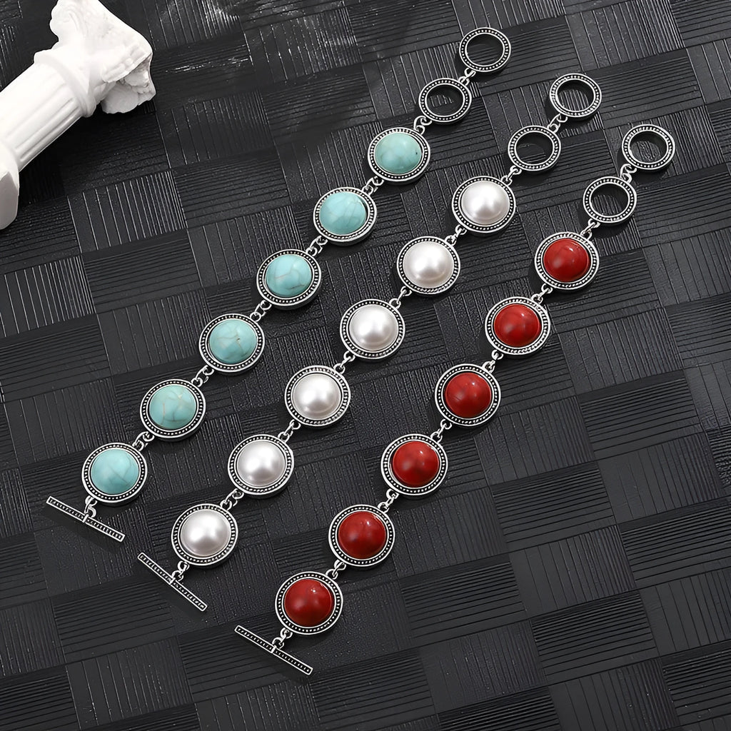 Ethnic style turquoise bracelet with ancient silver finish on wrist, green colour option