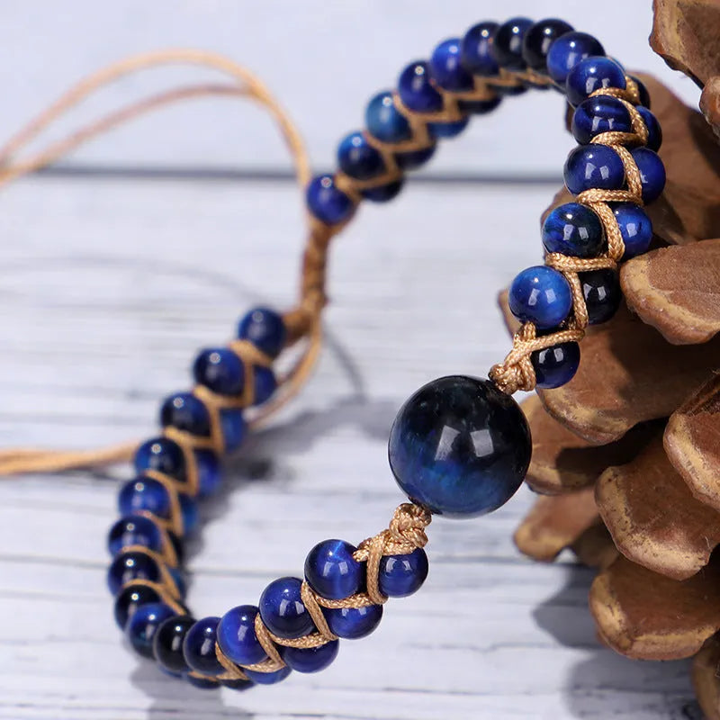 Handmade woven geometric pull bracelet with Tigereye and Amethyst beads in blue and purple colours