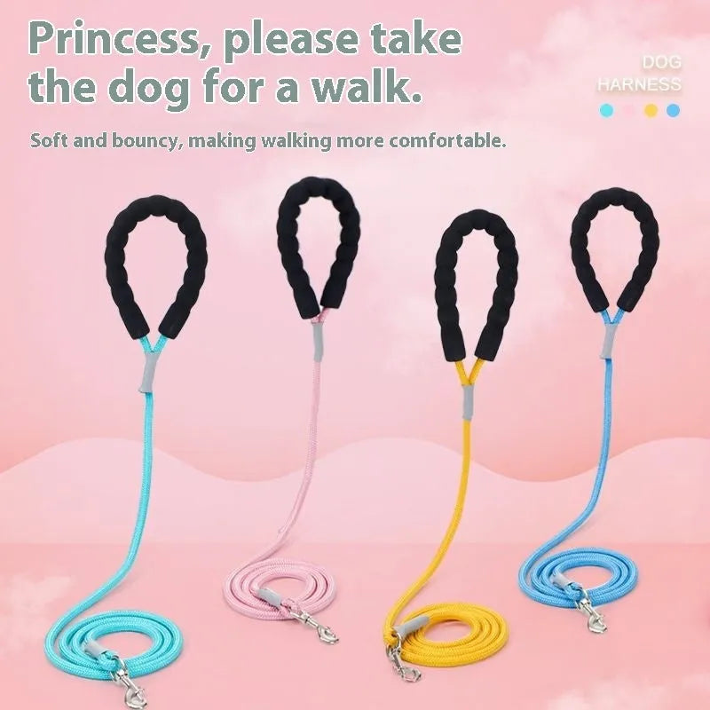 Pink polyester dog harness and bungee rope lead set shown on a size chart.