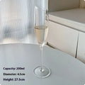 Clear glass champagne goblet in one of seven design styles including flute and tulip.