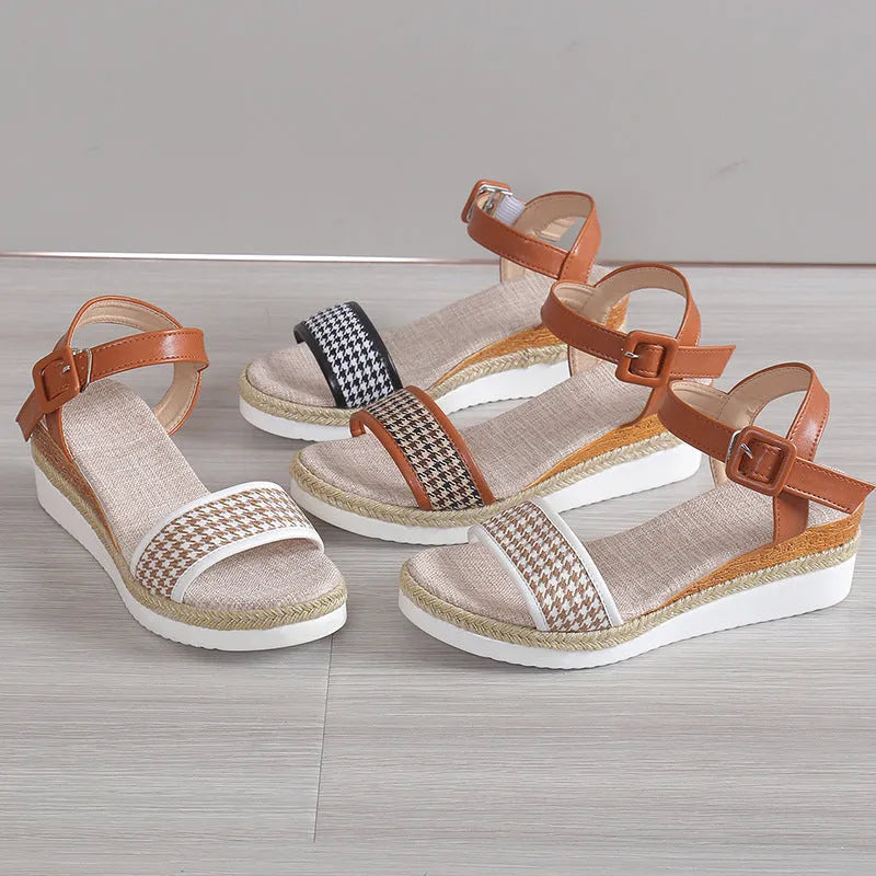 Women's houndstooth print buckle sandals in black with fish mouth toe on light background