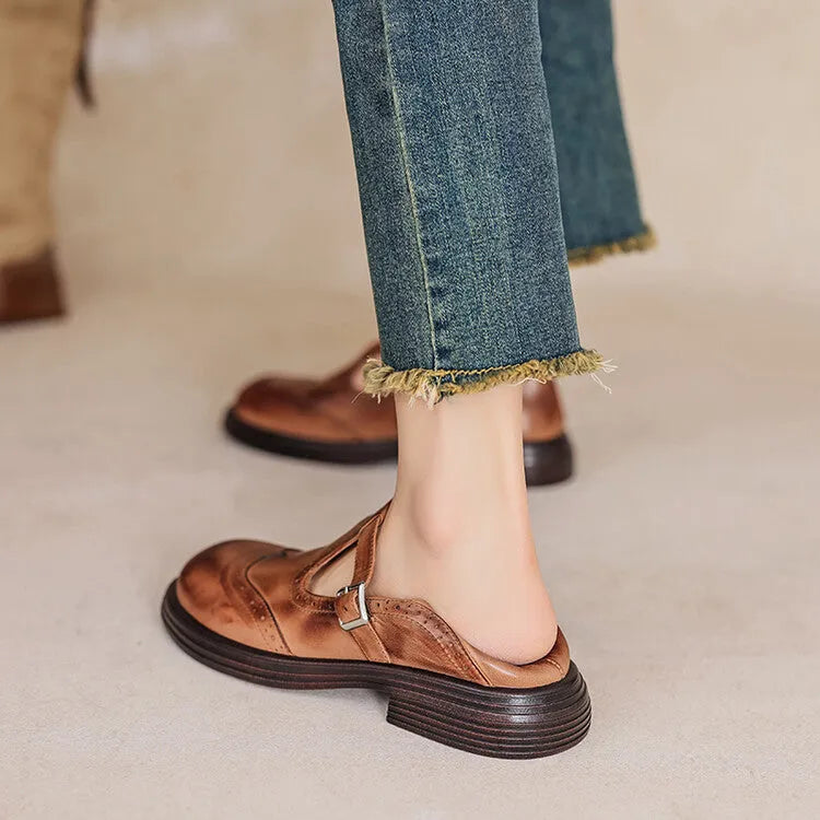Women's black and brown British style flat shoes with round toe made from sheepskin