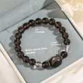Women's silver tone bracelet with 8mm ice stone opal cat head charm and adjustable chain