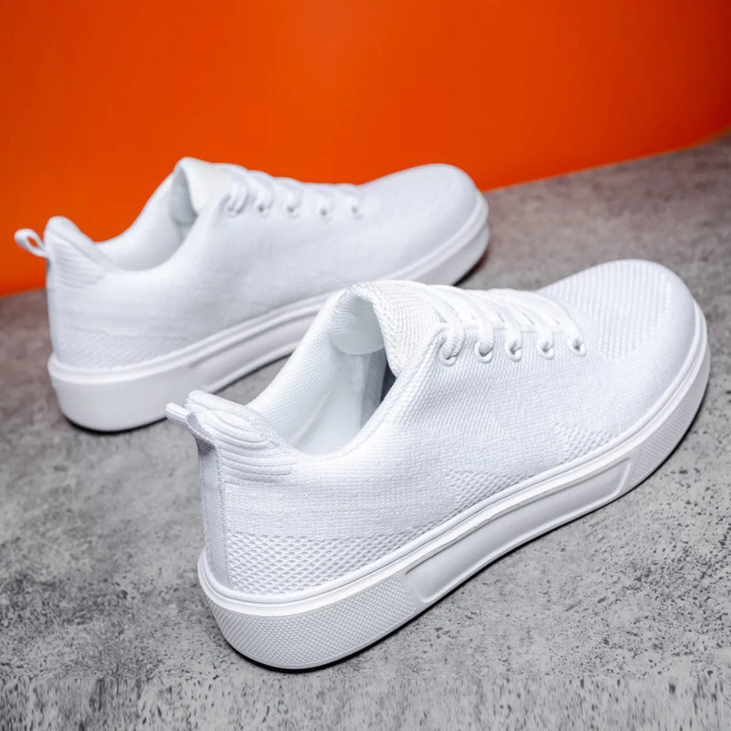 Light white sports casual shoes with mesh upper and thick EVA sole in black and white colour options