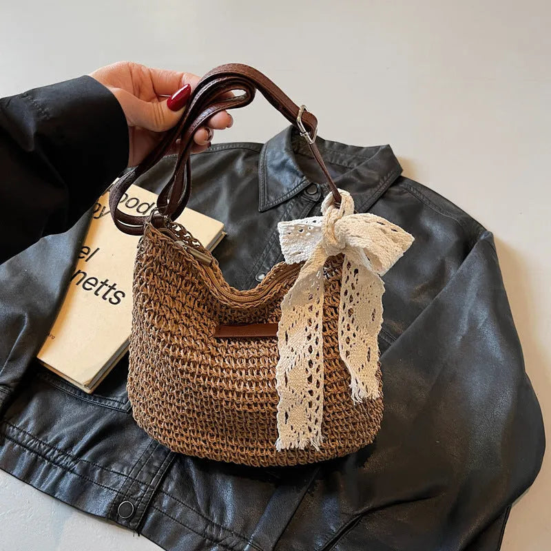 Women's woven straw messenger bag with hollowed pattern in khaki colour with zipper compartment