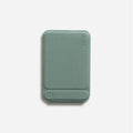Magnetic mobile phone holder case in MOVAS leather shown in black, blue, green, and grey colour options.