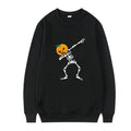 Women's printed long sleeve crew neck top in various colours on a hanger.