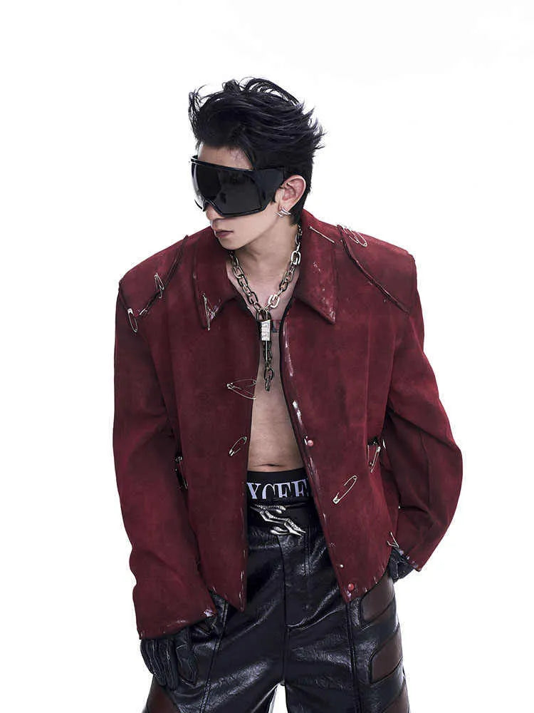 Red men's quilted jacket with decorative flocking pins and lapel collar in loose-fit style