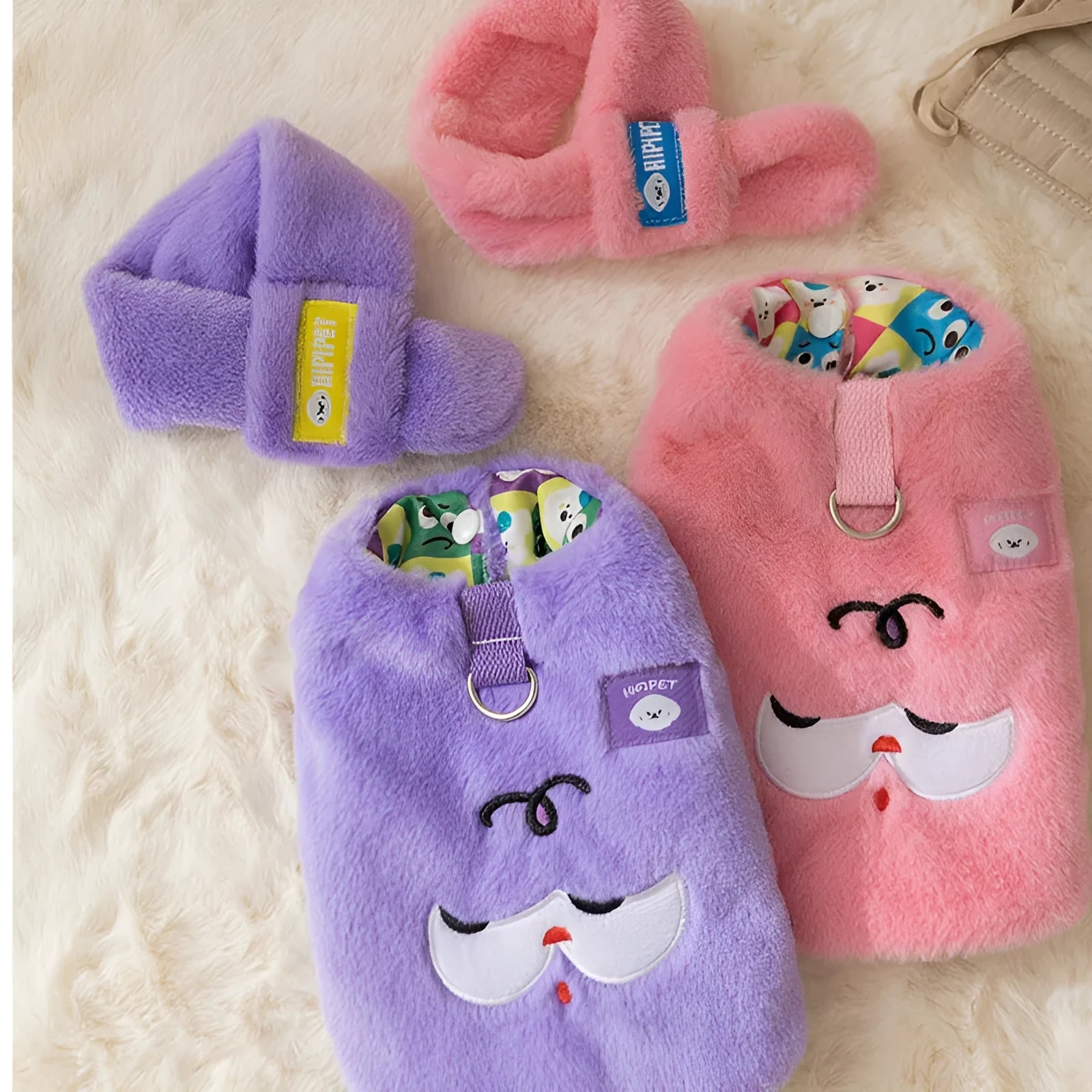Pink Korean dog hoodie with cute cartoon bear print and scarf on a small teddy dog