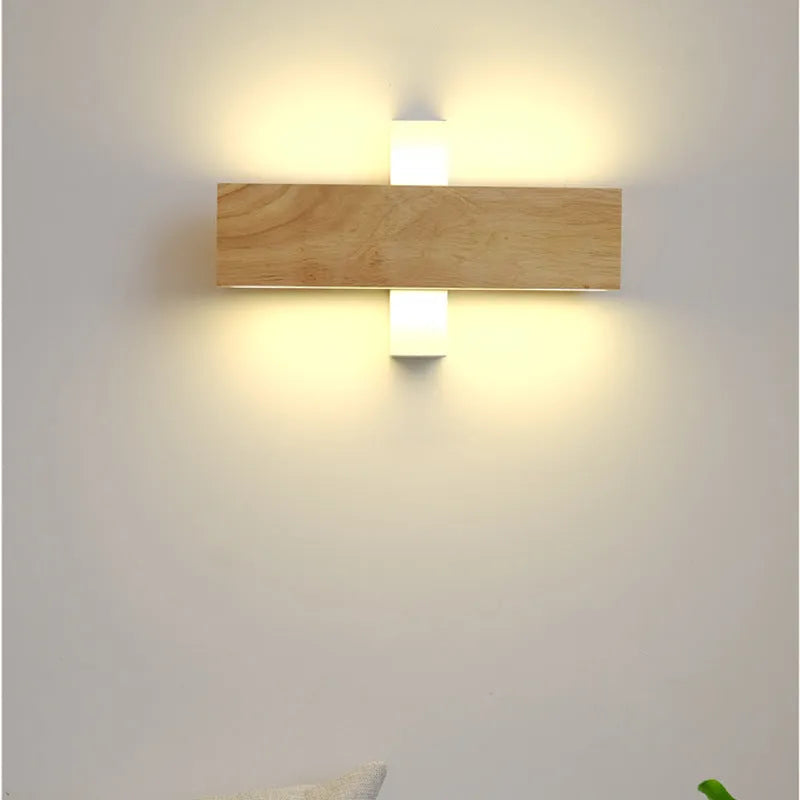 Solid wood Nordic Japanese style LED wall lamp with warm light, 32cm size, mounted above a wooden bedside table