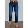Women's solid colour denim jeans with hand-worn distressing in dark blue, laid flat.