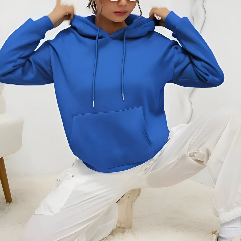 Women's loose grey sweatshirt with a drawstring hem and side pockets, laid flat.