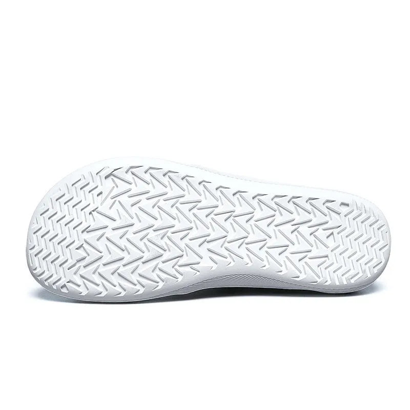 Men's black cloth casual shoes with soft sole and round wide toe on a solid background