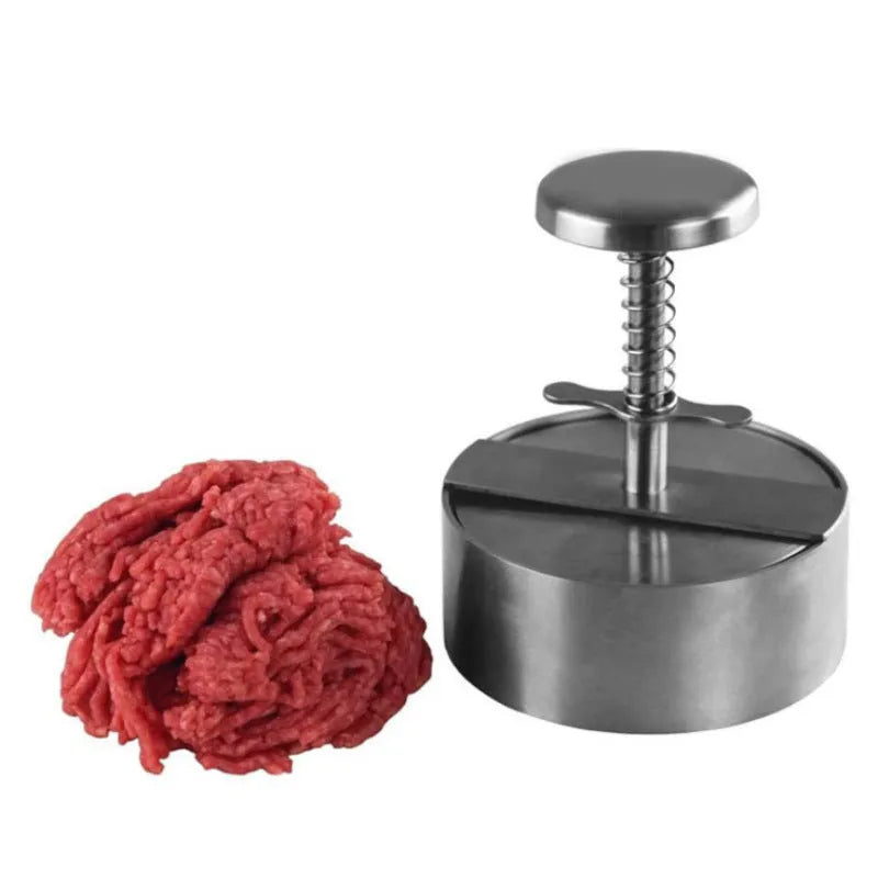 Silver stainless steel patties mould burger press on plain background