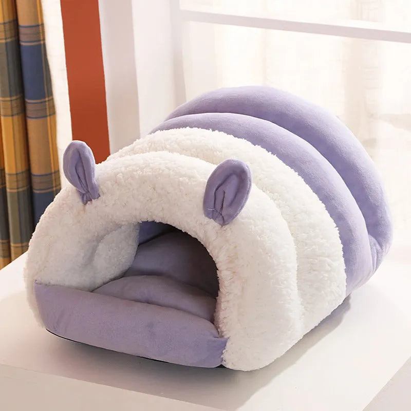 Blue enclosed cat nest bed with removable fleece liner, shown in a small size suitable for a kitten.