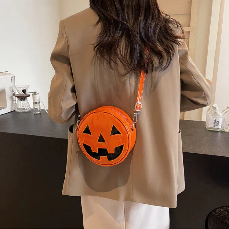 Small round pumpkin crossbody bag in PU, 18 x 18 x 7cm, shown in orange, black, and white