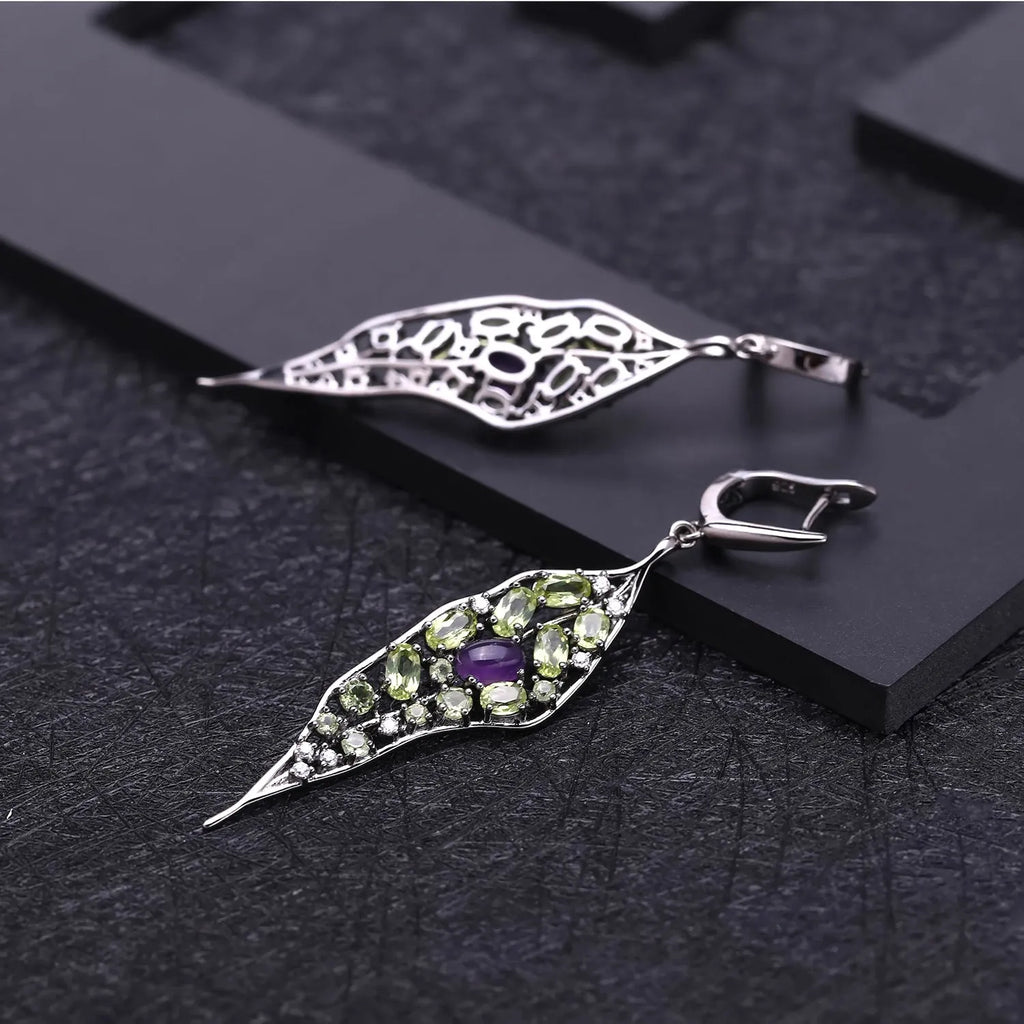 Women's 925 sterling silver earrings with purple amethyst and green olivine gems in a retro style