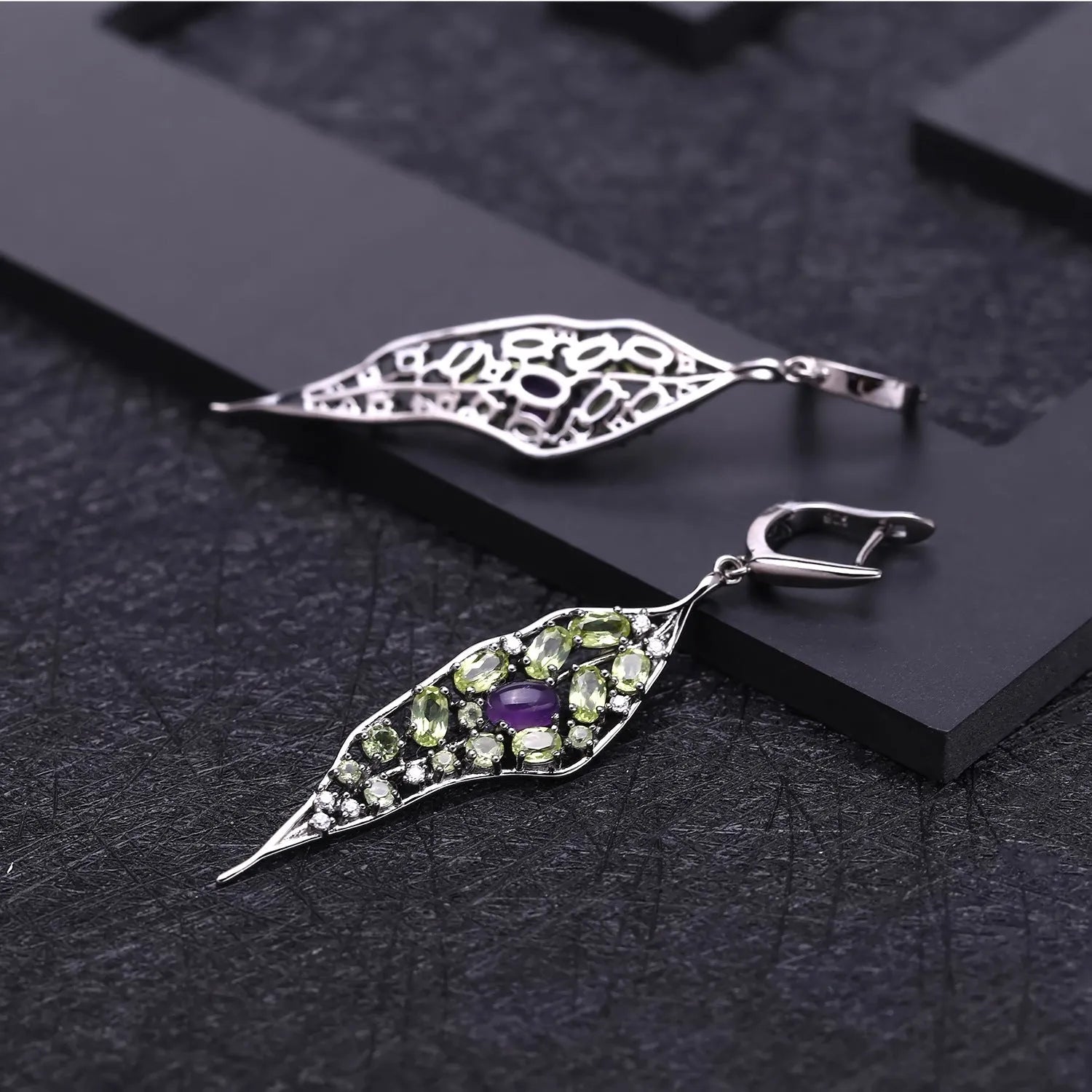 Women's 925 sterling silver earrings with purple amethyst and green olivine gems in a retro style