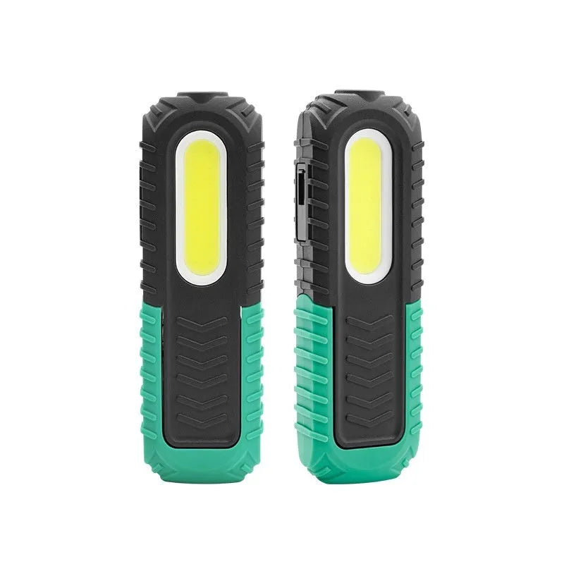 Black and green USB rechargeable auto inspection work light with drop-resistant coating.