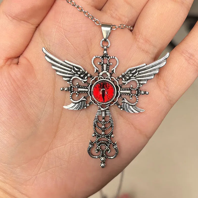 Devil wings and cross geometric pendant necklace on a 45cm chain, shown in red colour option.