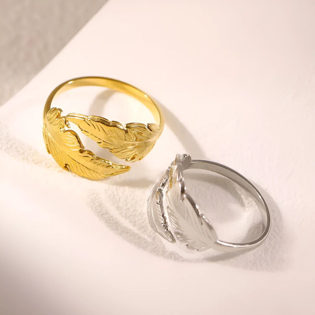 Adjustable stainless steel feather ring with electroplated silver or gold finish