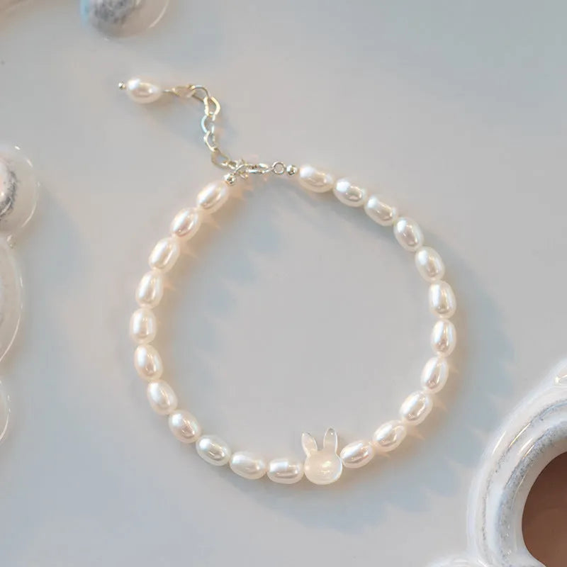 White shell pearl and 925 silver rabbit charm bracelet with elastic string