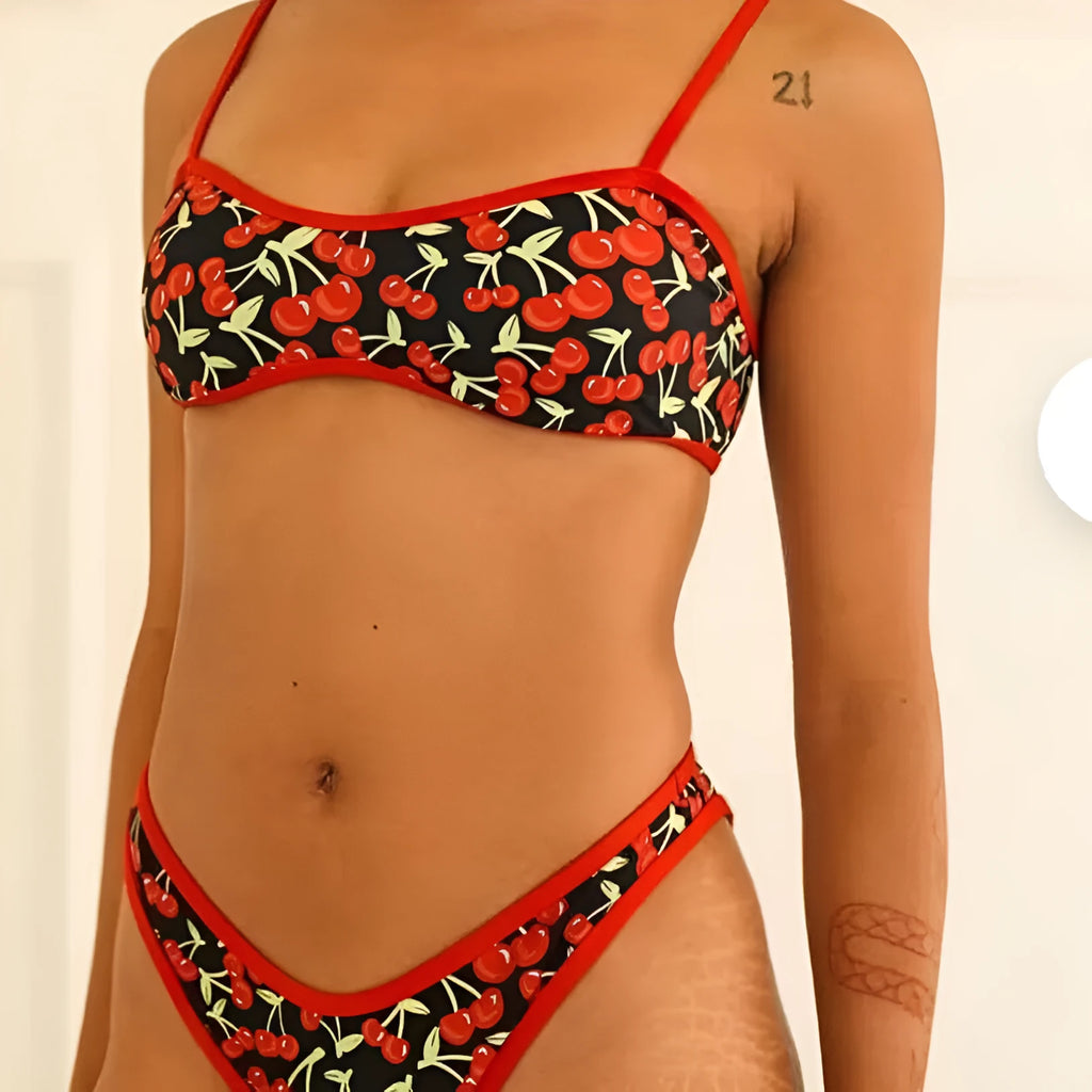 Women's cherry print floral bikini swimsuit with tube top and briefs.