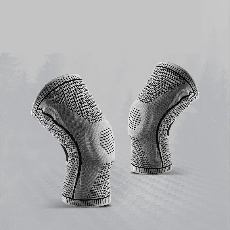 Knitted knee pads in black, grey, blue, and red colours for sports use
