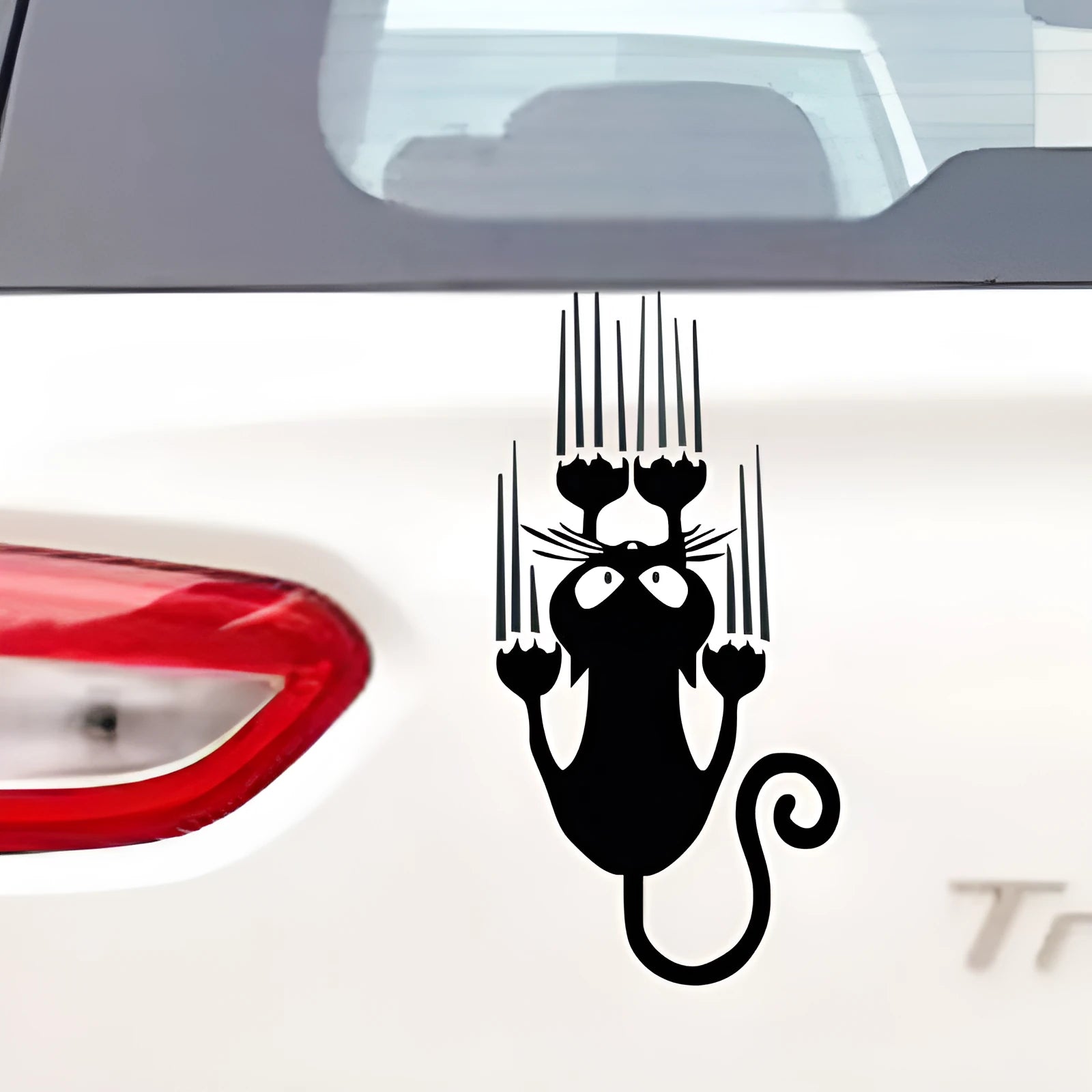 Reflective black cat paw car sticker 15x7.5cm on white car body panel