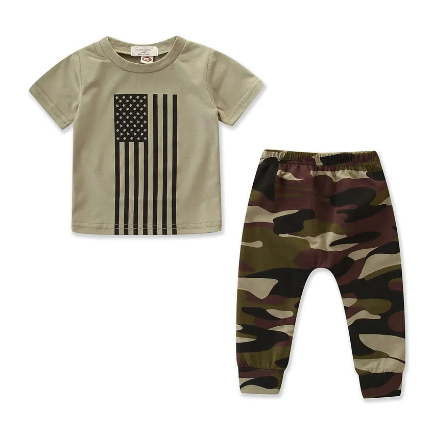 A little boy's camouflage print short sleeve shirt and pants summer suit set.