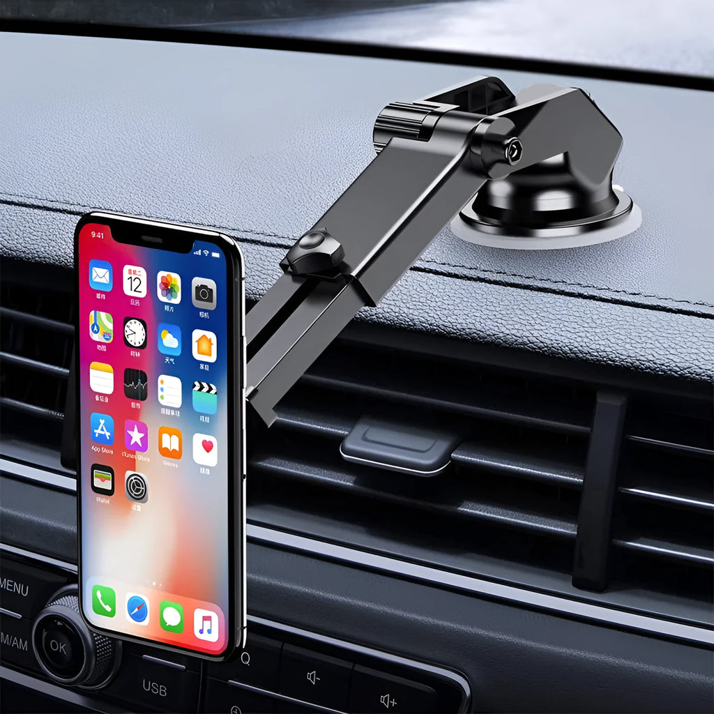 Magnetic suction car phone bracket in grey ABS PVC material on car dashboard