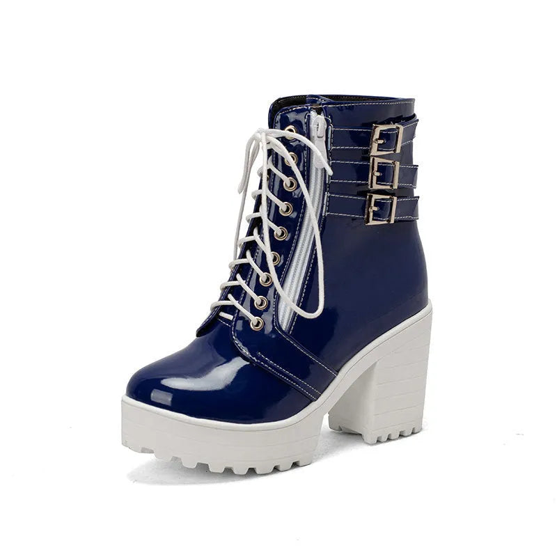 Women's black thick-heeled ankle boots with a lace-up front and waterproof platform on a rubber sole.