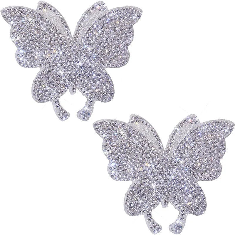 Glass car sticker patch with diamond crystals in bear claw or butterfly design, 7cm by 6cm.