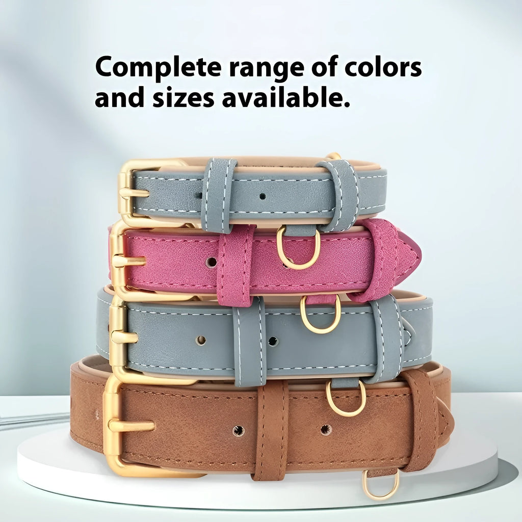 Brown double-layer leather dog collar with mohair lining and a matching leash on a wooden surface.