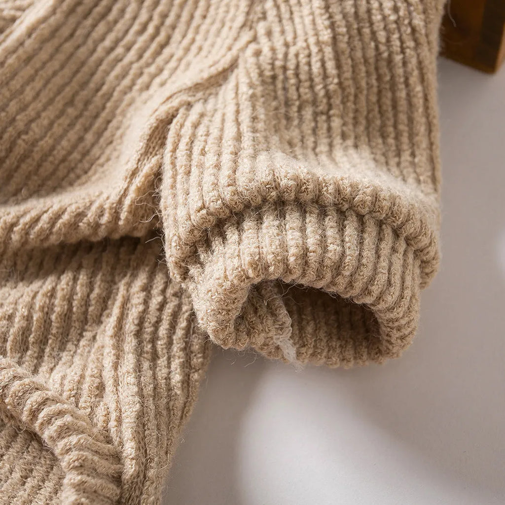 Brown knitted cloth sweater pullover on a small dog, showing casual style.