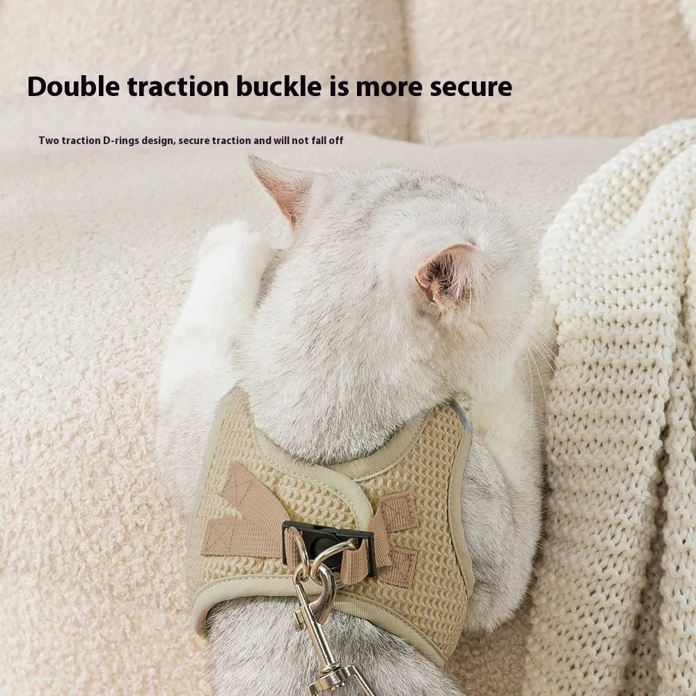 Brown cloth dog harness with a chest strap and hand-holding rope for walking control.